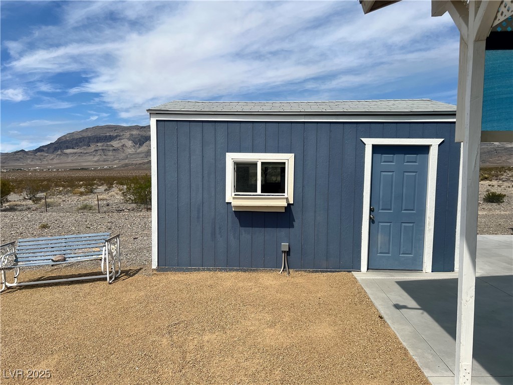 520 Burt Street Pahrump, NV 89060 - Photo 38 of 99 View of shed with a mountain view