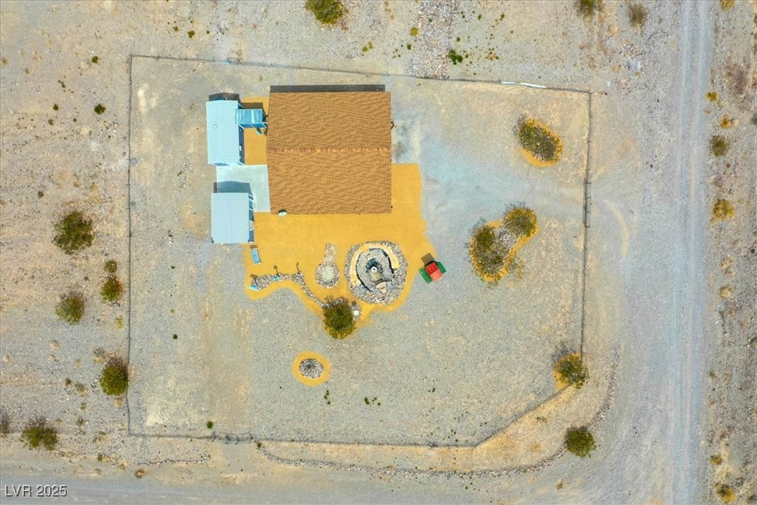 520 Burt Street Pahrump, NV 89060 - Photo 4 of 99 Overview of rural landscape featuring a desert landscape