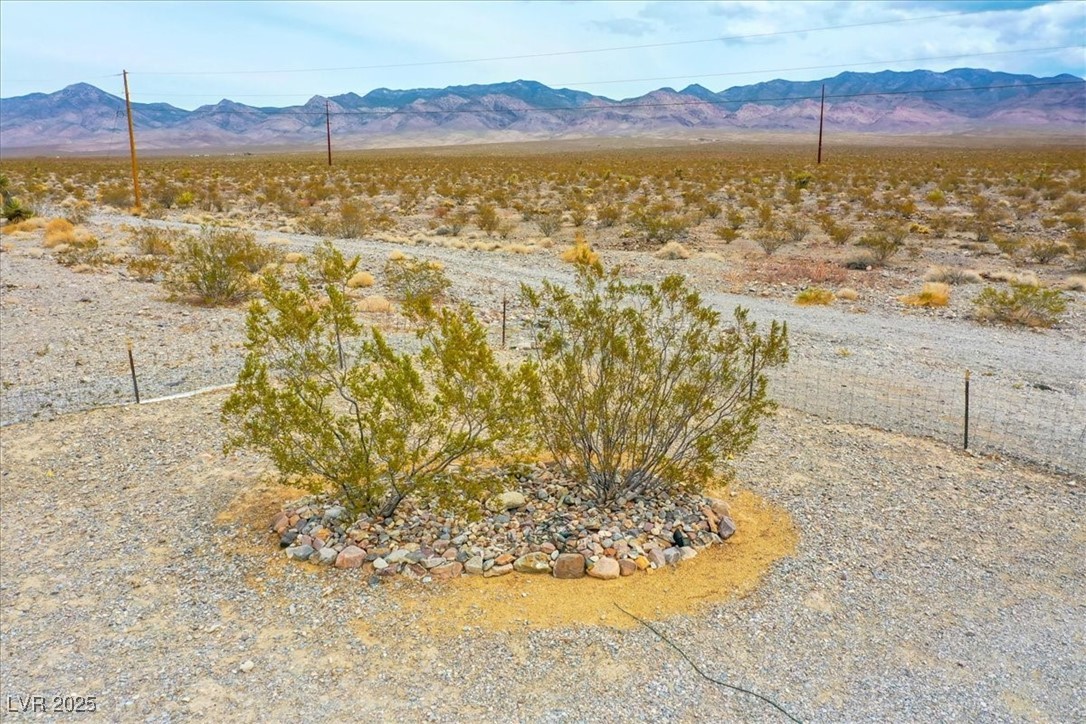 520 Burt Street Pahrump, NV 89060 - Photo 42 of 99 View of mountain backdrop featuring a desert landscape