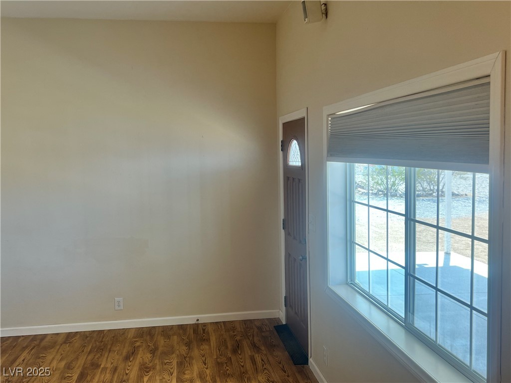 520 Burt Street Pahrump, NV 89060 - Photo 67 of 99 Entryway featuring wood finished floors and baseboards