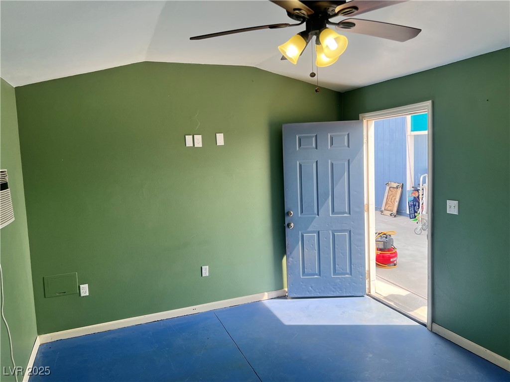 520 Burt Street Pahrump, NV 89060 - Photo 76 of 99 Third building with a ceiling fan, concrete floors, and lofted ceiling