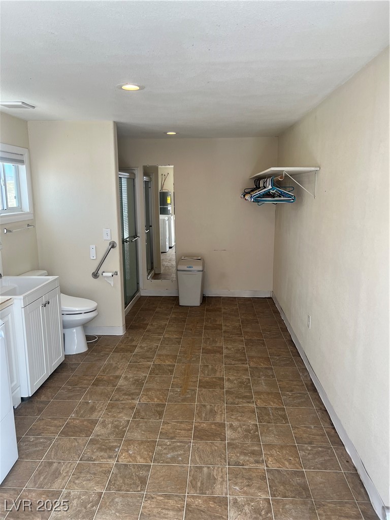 520 Burt Street Pahrump, NV 89060 - Photo 80 of 99 Bathroom featuring vanity and a stall shower