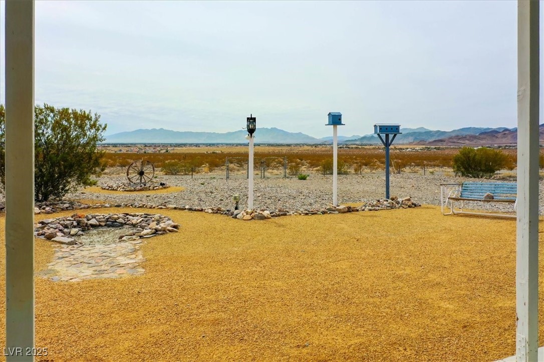 520 Burt Street Pahrump, NV 89060 - Photo 88 of 99 View of yard featuring a mountain view