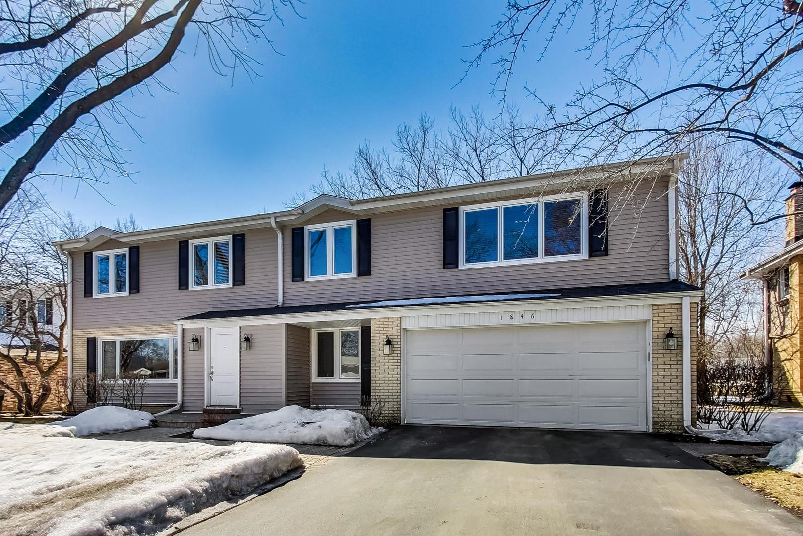 1846 Smith Road Northbrook, IL 60062 - Photo 1 of 58 a front view of a house with a yard