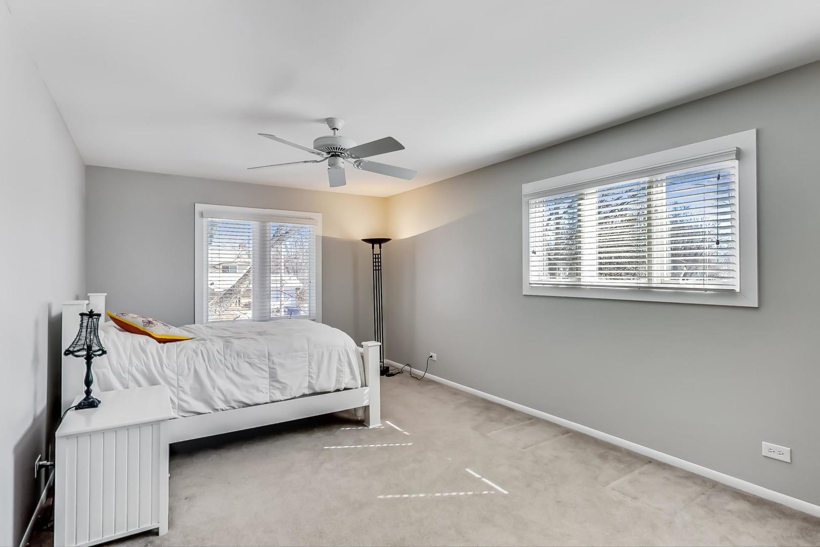 1846 Smith Road Northbrook, IL 60062 - Photo 30 of 58 a bedroom with a bed and window