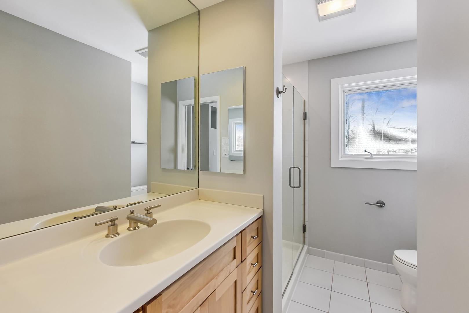 1846 Smith Road Northbrook, IL 60062 - Photo 32 of 58 a bathroom with a sink toilet and shower