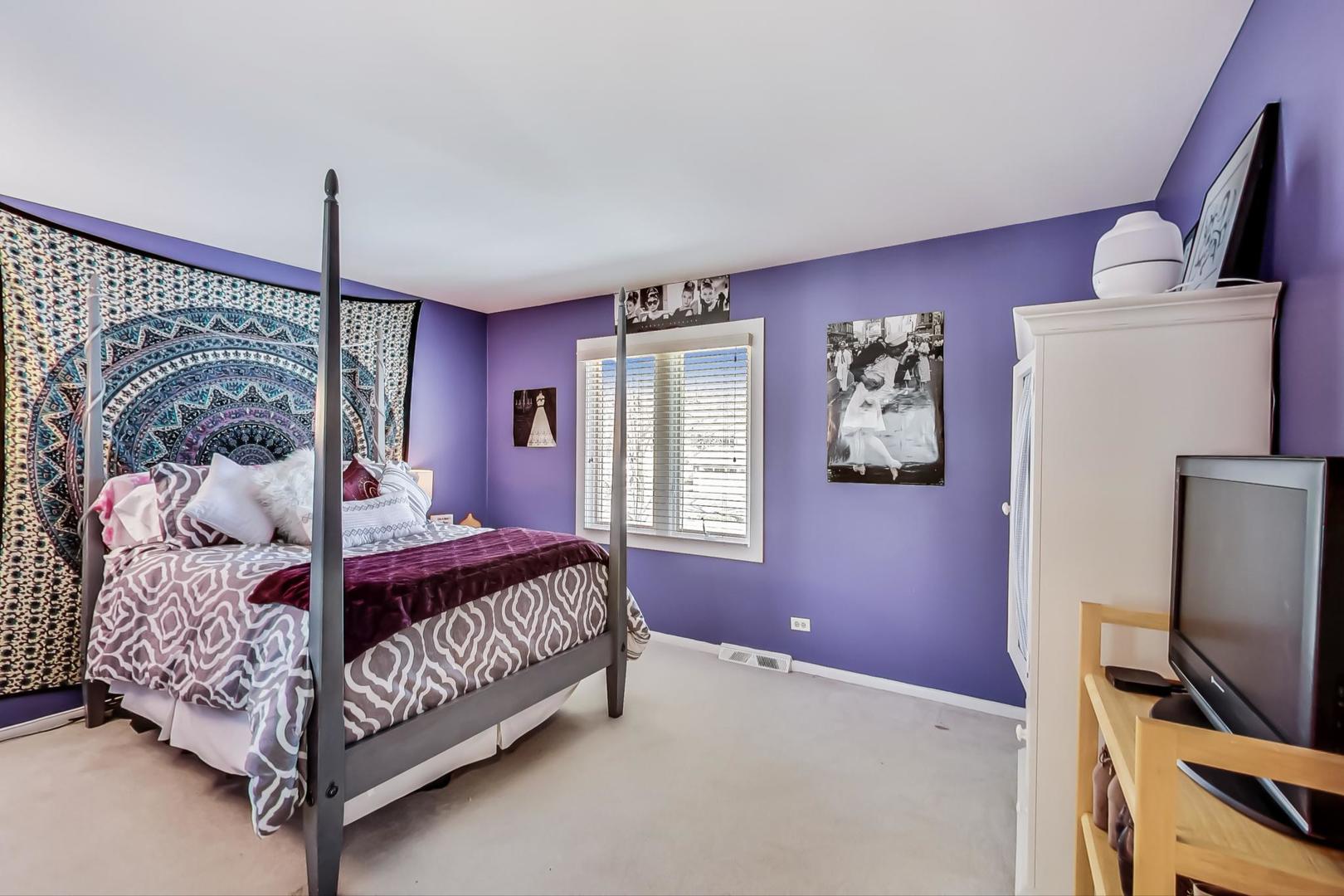 1846 Smith Road Northbrook, IL 60062 - Photo 33 of 58 a bedroom with a bed window and flat screen tv