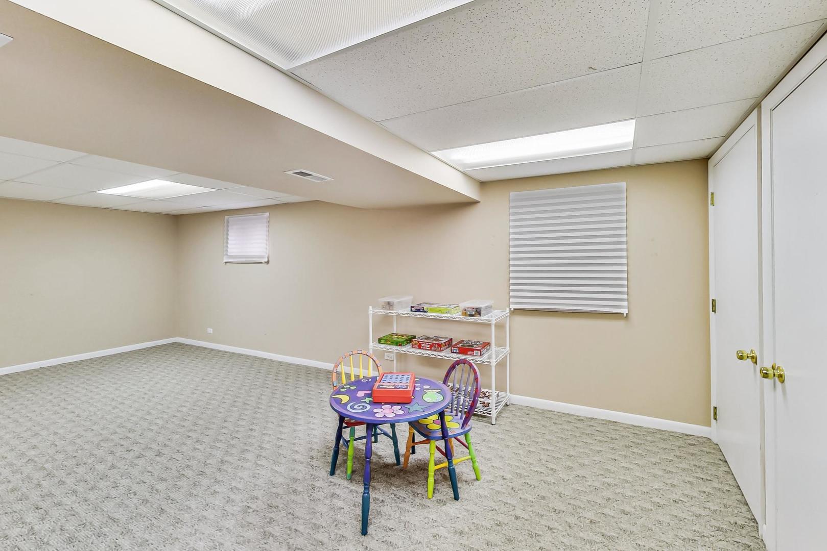 1846 Smith Road Northbrook, IL 60062 - Photo 43 of 58 a view of a room with furniture window and wooden floor
