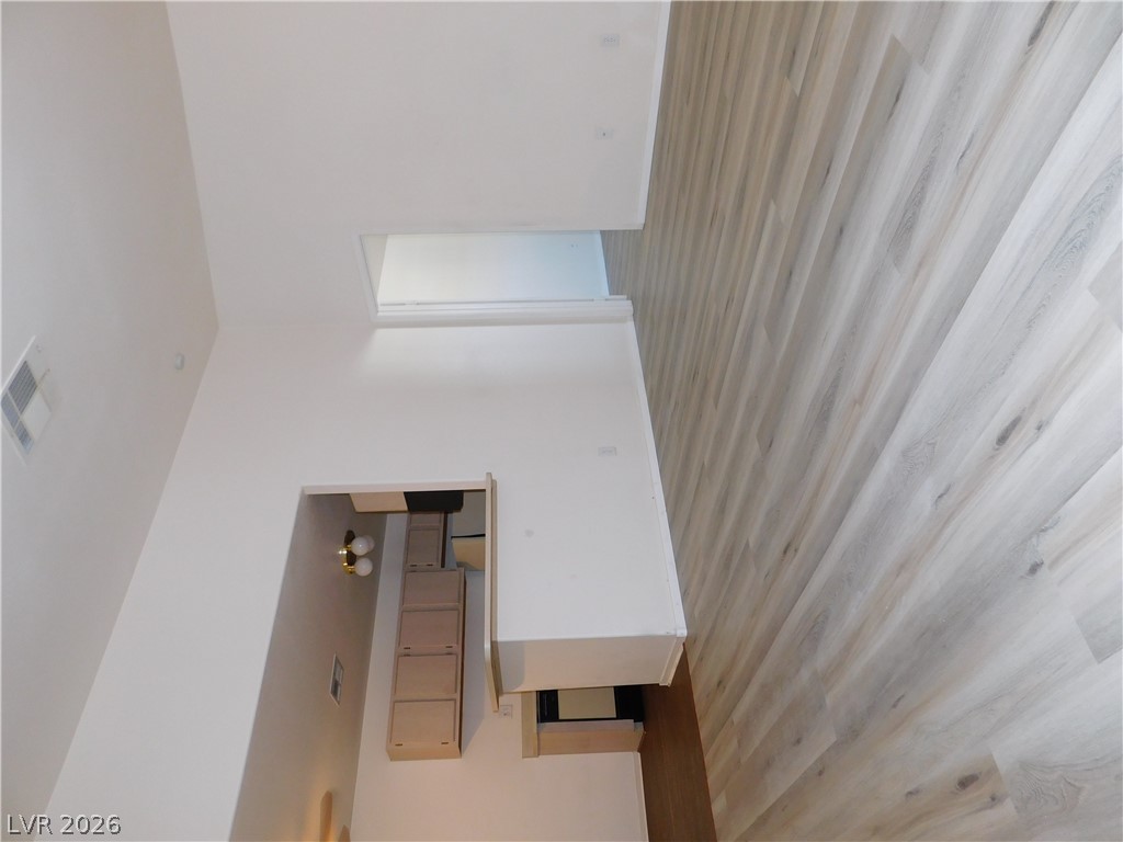5221 South Lindell Road, Unit 202 Las Vegas, NV 89118 - Photo 16 of 28 Clean lines and a spacious layout define this appealing living space with durable flooring.