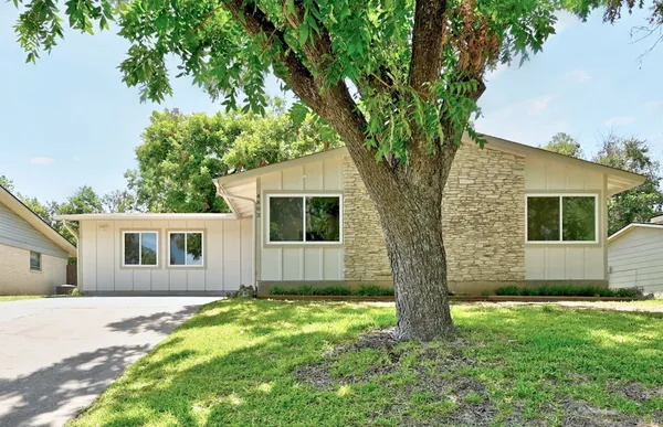 a front view of house with yard