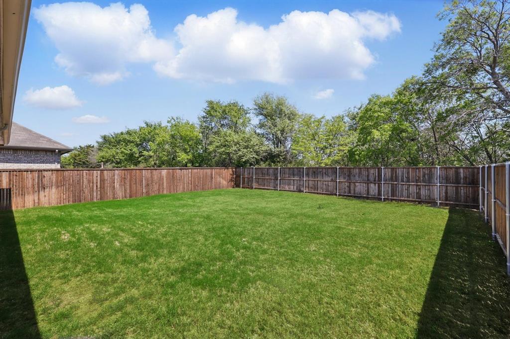 5605 Round Hl Road Denton, TX 76210 - Photo 14 of 15 Fenced in Backyard