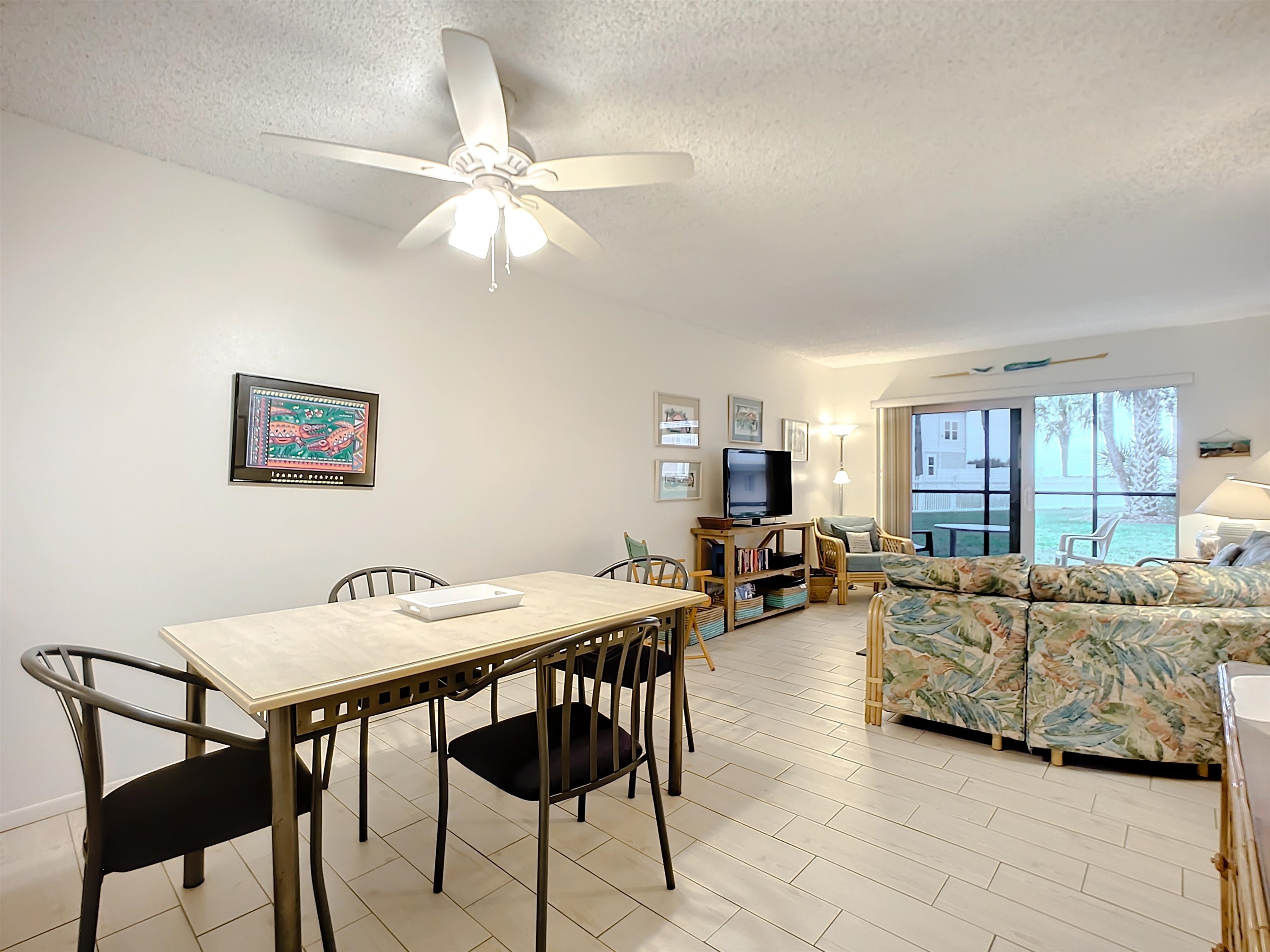 4 Ocean Trace Road, Unit 123 St. Augustine, FL 32080 - Photo 11 of 30 a living room with furniture and a window