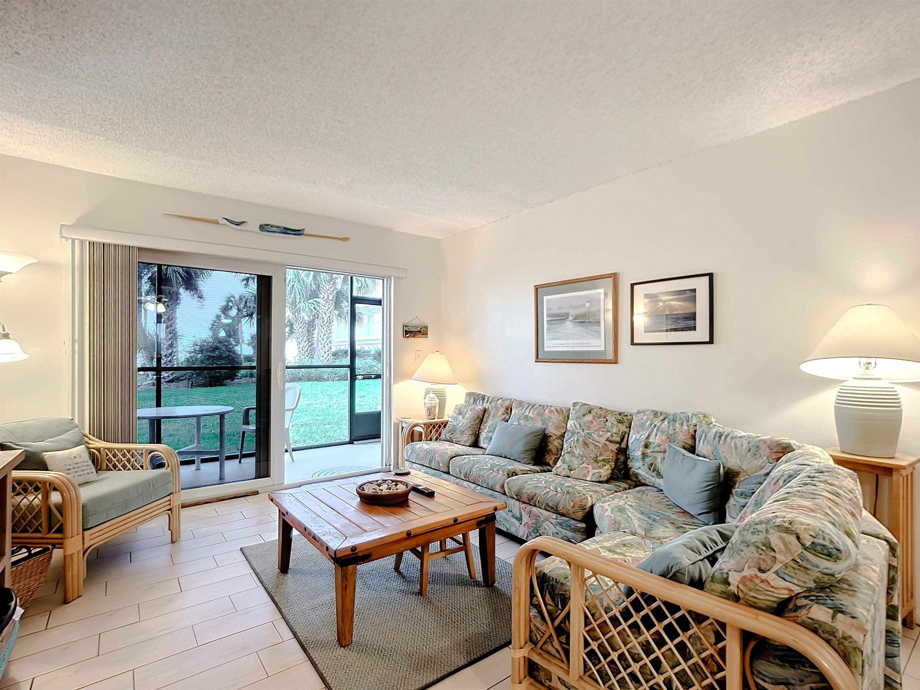 4 Ocean Trace Road, Unit 123 St. Augustine, FL 32080 - Photo 14 of 30 a living room with furniture and a large window