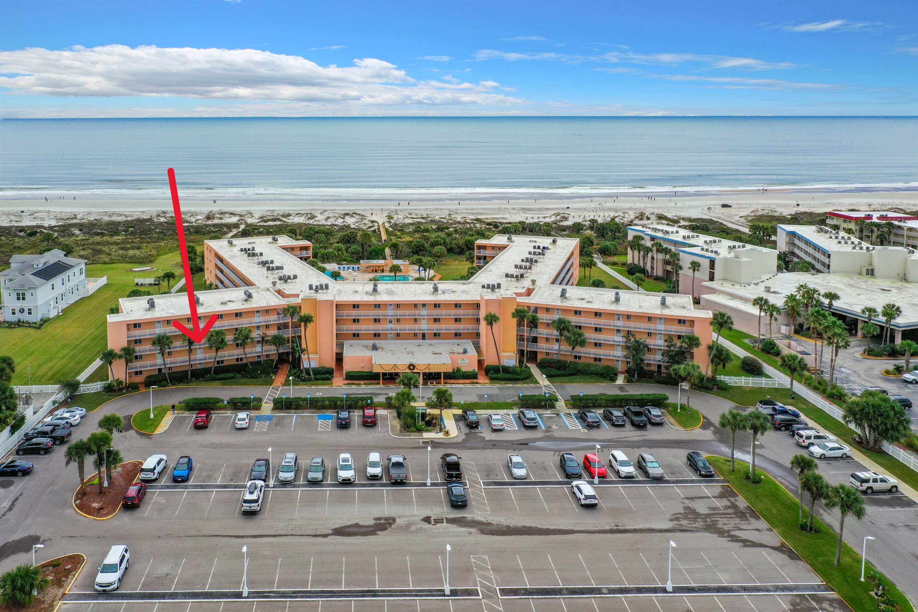 4 Ocean Trace Road, Unit 123 St. Augustine, FL 32080 - Photo 2 of 30 a room with lots of different kinds of flowers