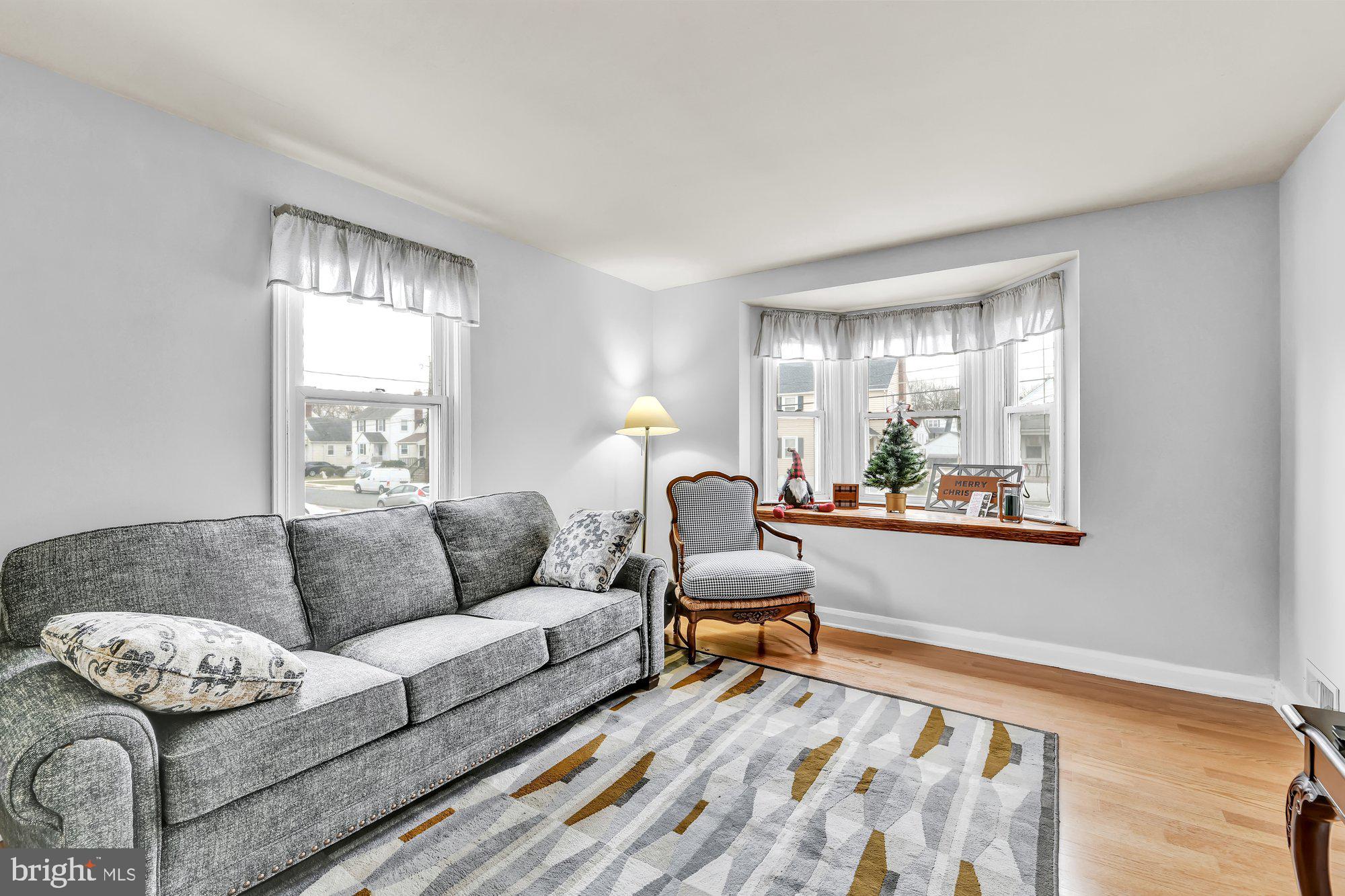 3030 Parktowne Road Baltimore, MD 21234 - Photo 5 of 20 Gleaming hardwood floors and natural light