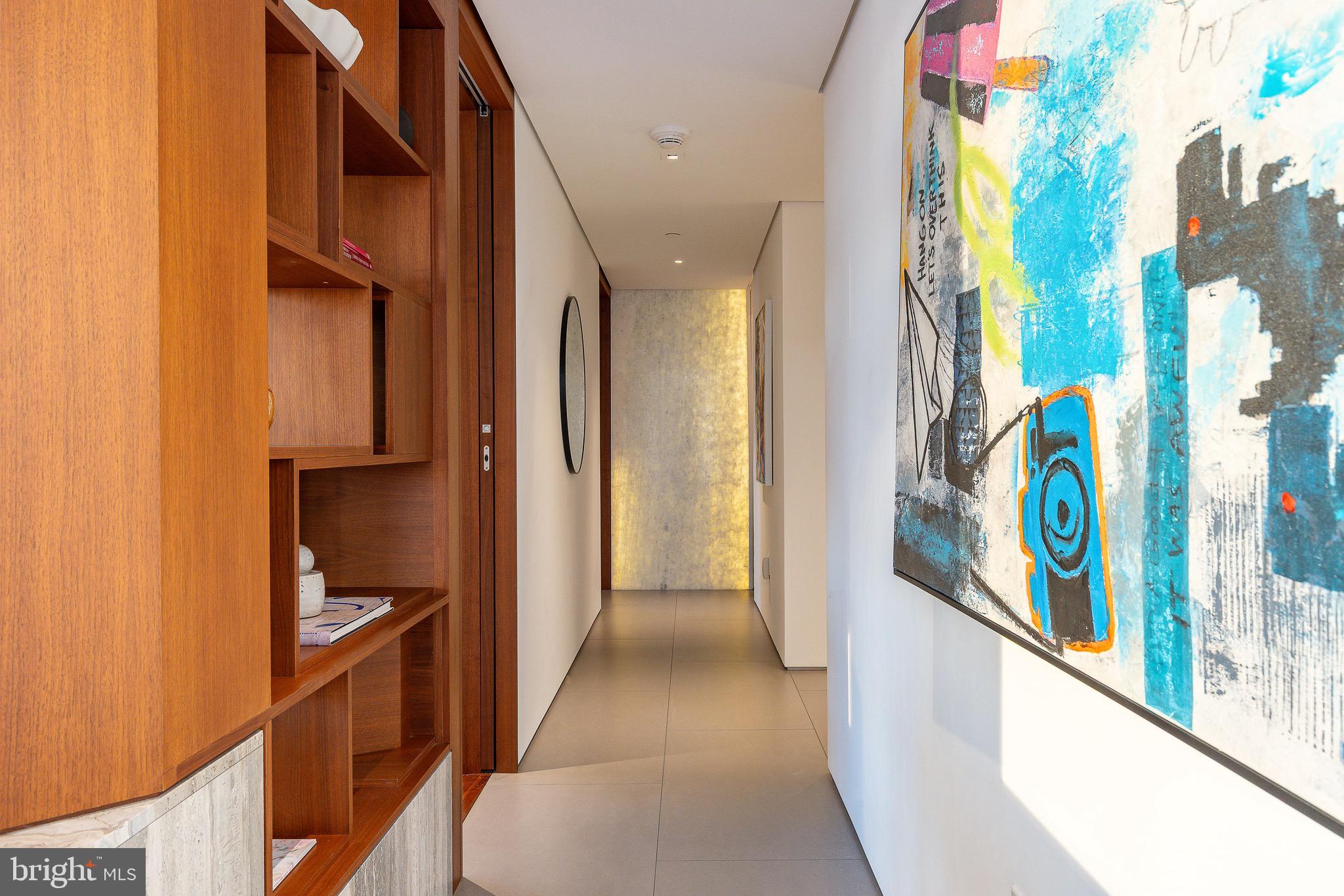 210 West Rittenhouse Square, Unit 21062107 Philadelphia, PA 19103 - Photo 31 of 74 a view of a hallway with furniture and stairs