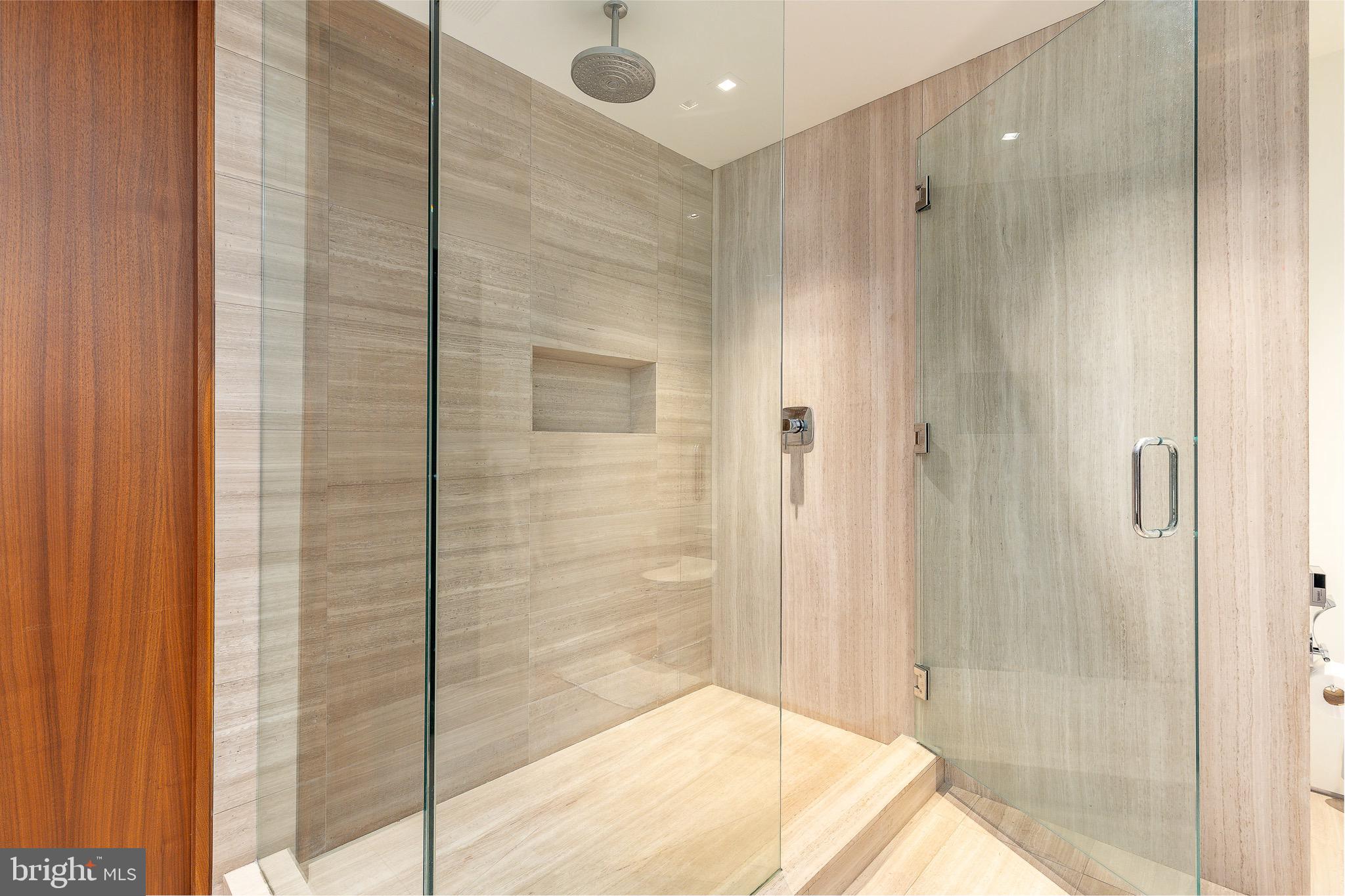 210 West Rittenhouse Square, Unit 21062107 Philadelphia, PA 19103 - Photo 48 of 74 a bathroom with a shower and a glass door