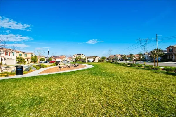 a view of yard with swimming pool