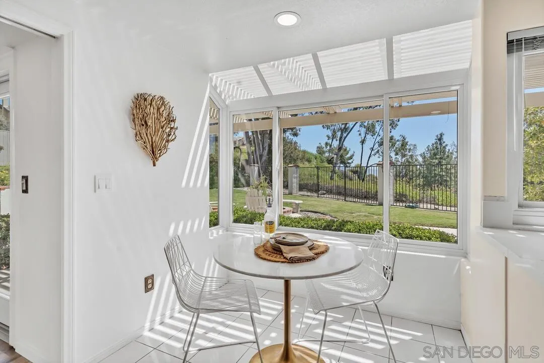 7967 Wing Span Drive San Diego, CA 92119 - Photo 14 of 45 a view of a dining room with furniture window and outside view