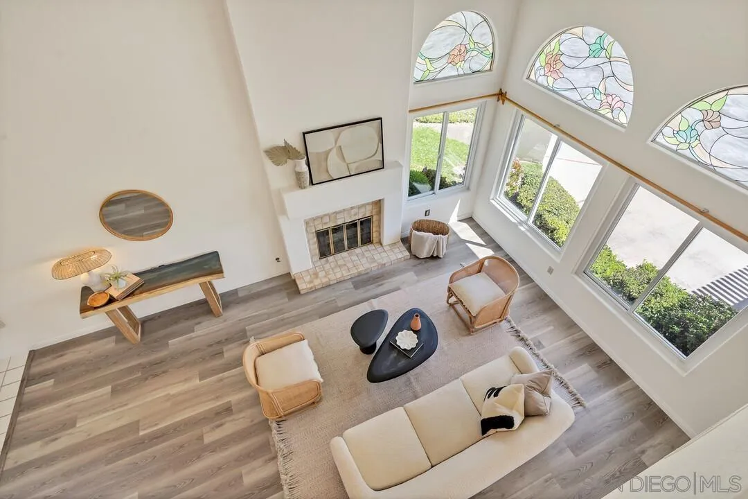 7967 Wing Span Drive San Diego, CA 92119 - Photo 23 of 45 a living room with furniture and a large window