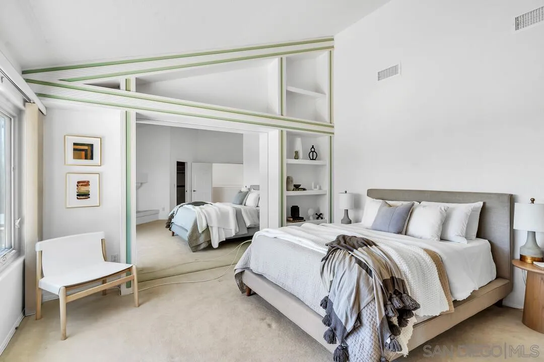 7967 Wing Span Drive San Diego, CA 92119 - Photo 25 of 45 a spacious bedroom with a bed and window