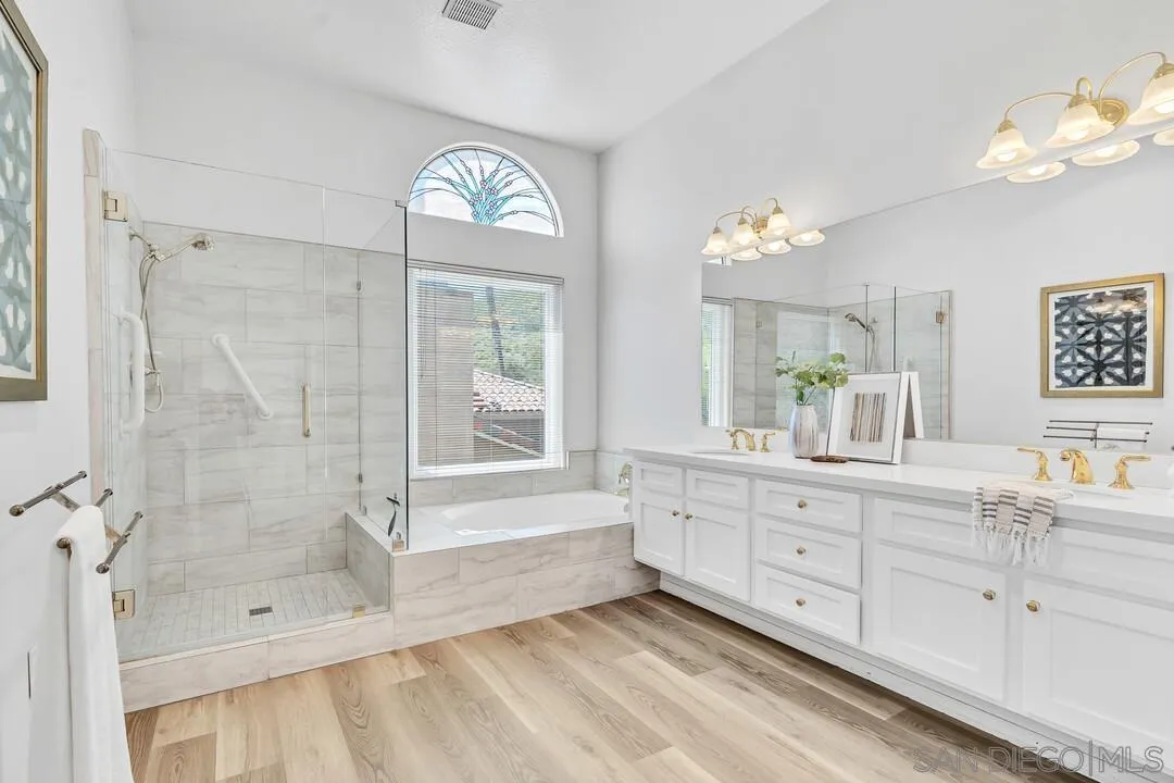 7967 Wing Span Drive San Diego, CA 92119 - Photo 27 of 45 a spacious bathroom with double sink and a mirror