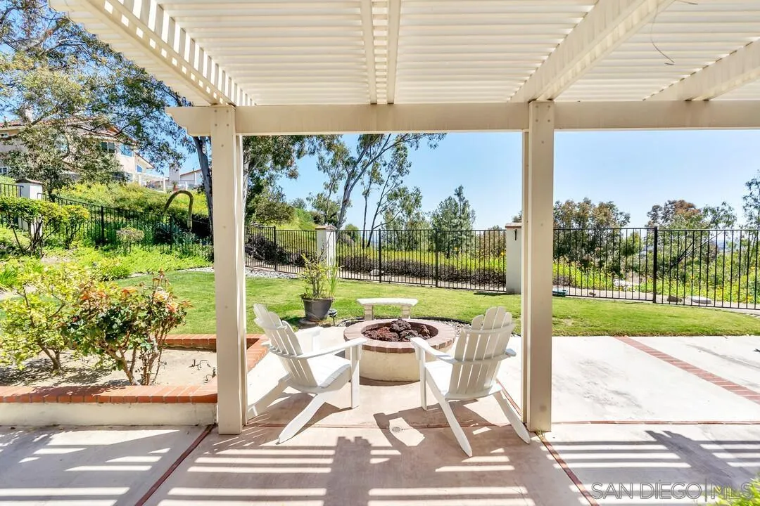 7967 Wing Span Drive San Diego, CA 92119 - Photo 33 of 45 a patio with garden area and outdoor seating