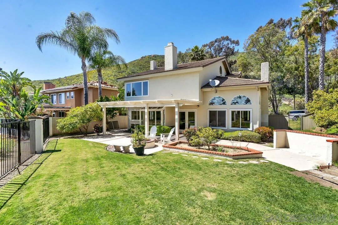 7967 Wing Span Drive San Diego, CA 92119 - Photo 36 of 45 a front view of house with outdoor seating yard and green space