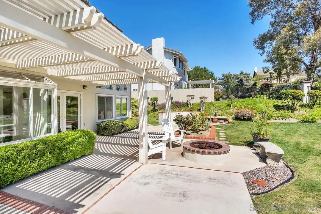 7967 Wing Span Drive San Diego, CA 92119 - Photo 37 of 45 a view of a patio with couches table and chairs and potted plants