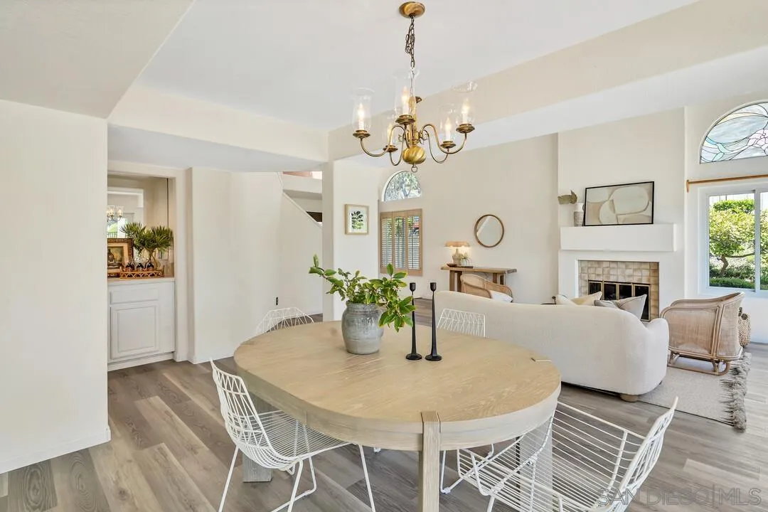 7967 Wing Span Drive San Diego, CA 92119 - Photo 9 of 45 a view of a dining room with furniture and chandelier