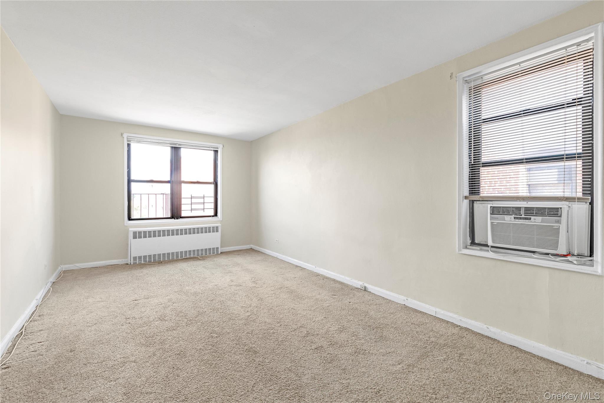 150-11 72nd Road, Unit 6E Queens, NY 11367 - Photo 2 of 13 an empty room with a window