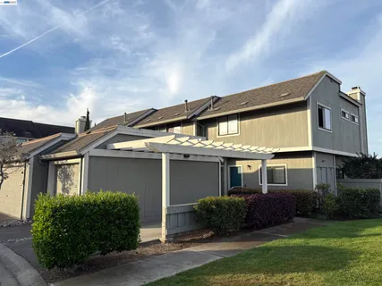 front view of a house with a garden