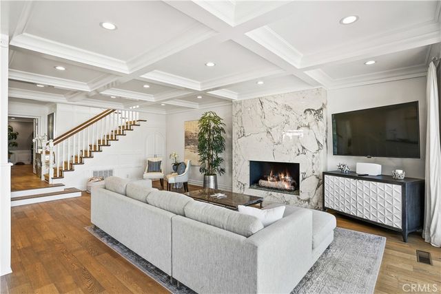 a view of living room with furniture and a window