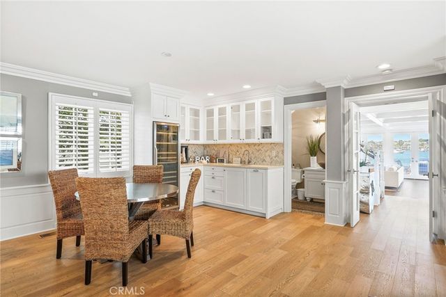 a bedroom with a large bed and a fireplace