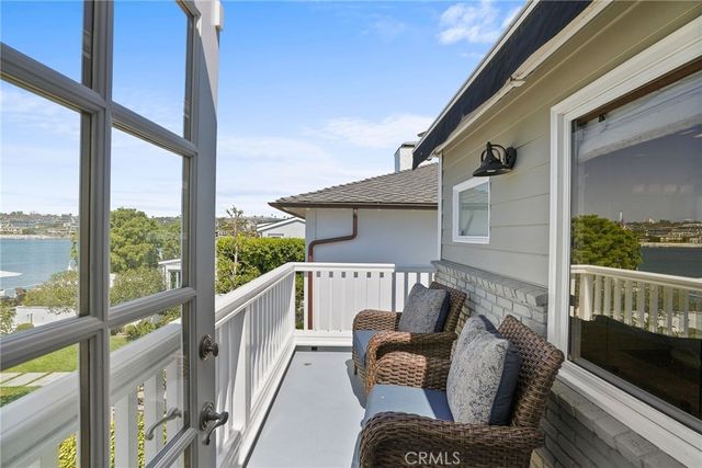 a bathroom with a sink vanity granite shower and a mirror