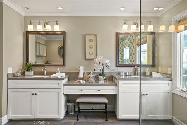 a bedroom with a bed and dresser