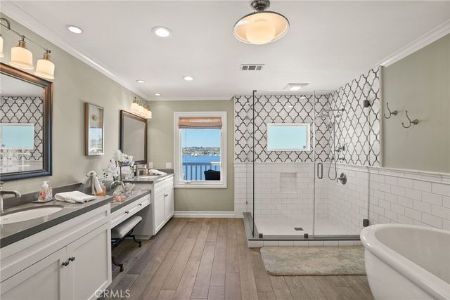 a kitchen with a refrigerator and a stove