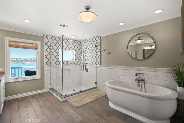 a utility room with sink dryer and washer