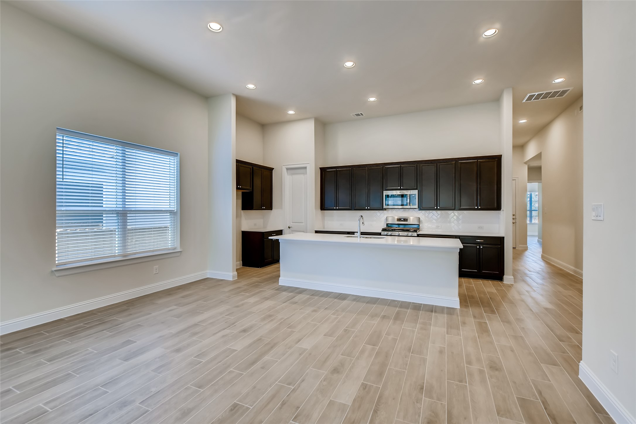 601 C-Bar Ranch Trail, Unit 28 Cedar Park, TX 78613 - Photo 15 of 27 Kitchen Opens to Dining and Living Areas