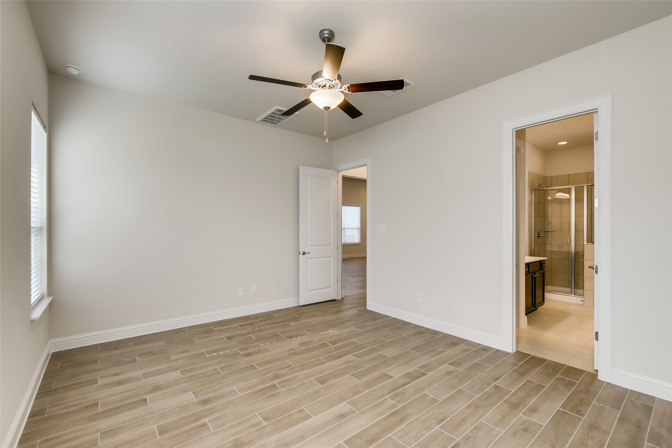 601 C-Bar Ranch Trail, Unit 28 Cedar Park, TX 78613 - Photo 18 of 27 Primary Bedroom