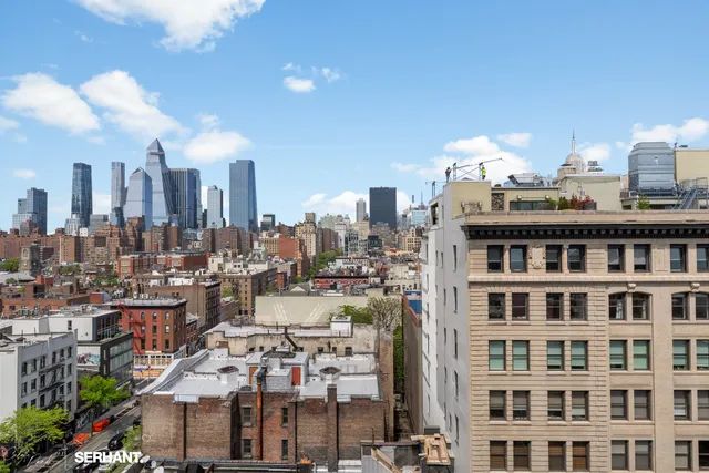 a view of a city that has tall buildings