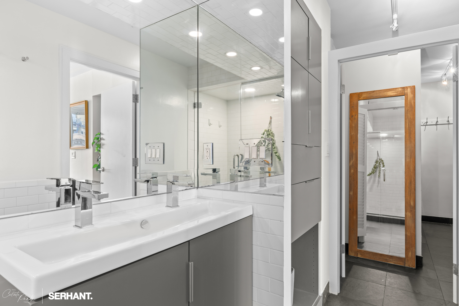 270 West 17th Street, Unit 12BC Manhattan, NY 10011 - Photo 14 of 23 a bathroom with a sink double vanity and a mirror