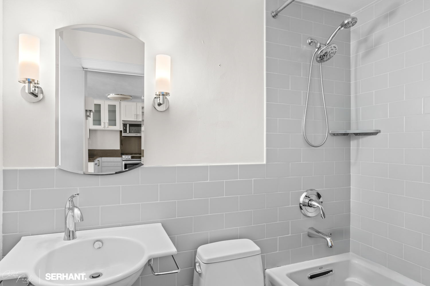 270 West 17th Street, Unit 12BC Manhattan, NY 10011 - Photo 18 of 23 a bathroom with a sink a toilet and shower