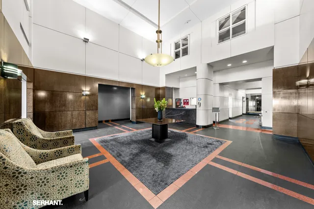 a kitchen with stainless steel appliances granite countertop a sink and a counter