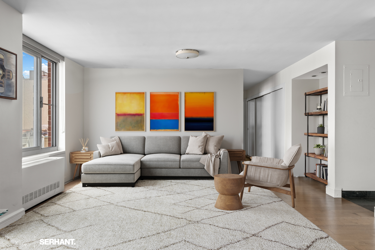 270 West 17th Street, Unit 12BC Manhattan, NY 10011 - Photo 3 of 23 a living room with furniture and a window