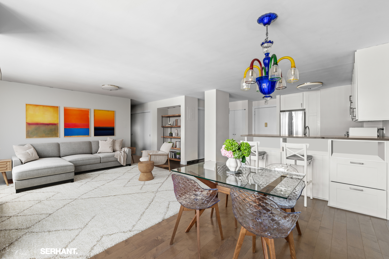 270 West 17th Street, Unit 12BC Manhattan, NY 10011 - Photo 4 of 23 a living room with furniture and wooden floor