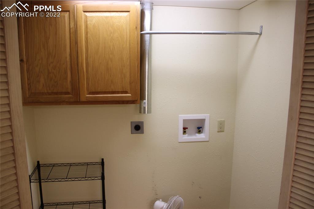 749 B 9th Street Calhan, CO 80808 - Photo 34 of 46 a bathroom with a shower and a sink