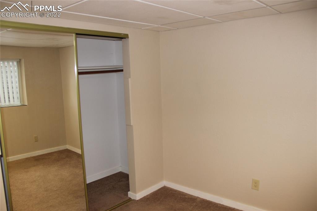 749 B 9th Street Calhan, CO 80808 - Photo 39 of 46 a view of small space with wooden floor