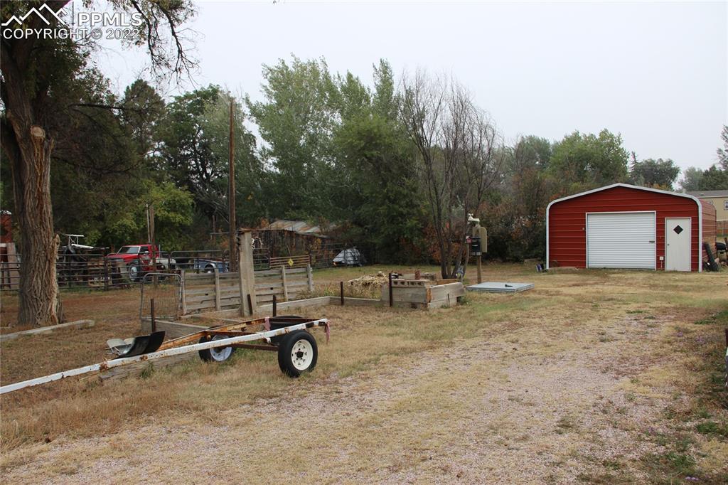 749 B 9th Street Calhan, CO 80808 - Photo 46 of 46 a view of a house with backyard space and sitting area