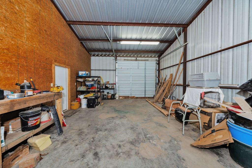 4460 Hildreth Pool Road Bowie, TX 76230 - Photo 23 of 40 a view of a storage & utility room with stuff